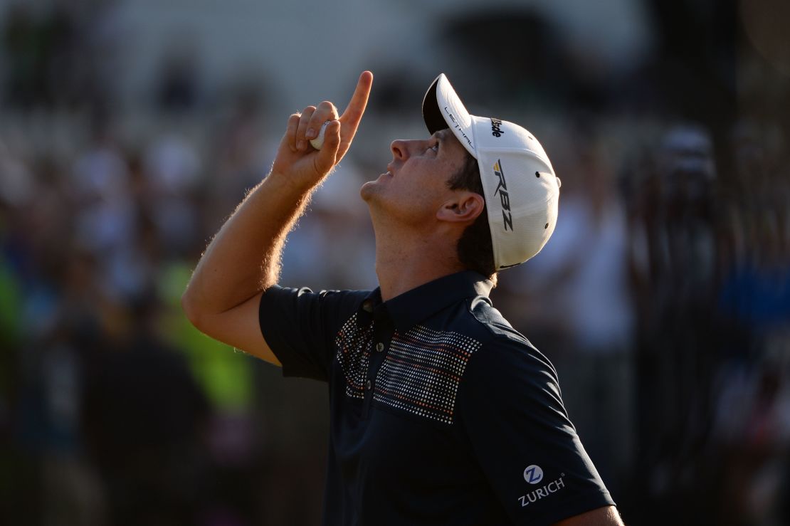 Justin Rose looks to the heavens in tribute to his late father after winning the US Open.