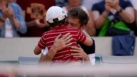France's Nicolas Mahut hugs his son after losing in the French Open in  Paris last month.