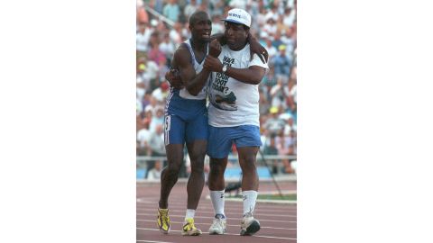 Derek Redmond is helped by his father at the Barcelona Olympics.