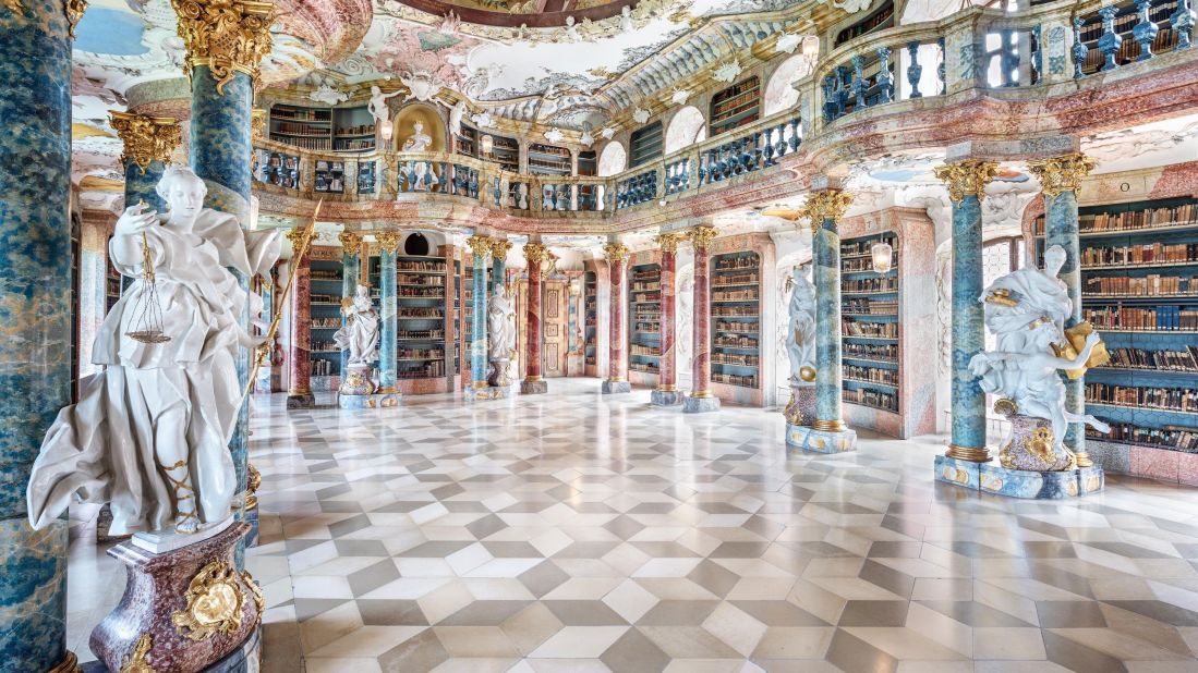 <strong>Wiblingen Abbey Library: </strong>With its elaborate ceiling paintings by Franz Martin Kühn and intricate gold-trimmed pillars, the Rococo style library at Wiblingen Abbey is considered one of the most beautiful book rooms in the world. The monastery's church area also houses celestial frescoes and a striking altar.