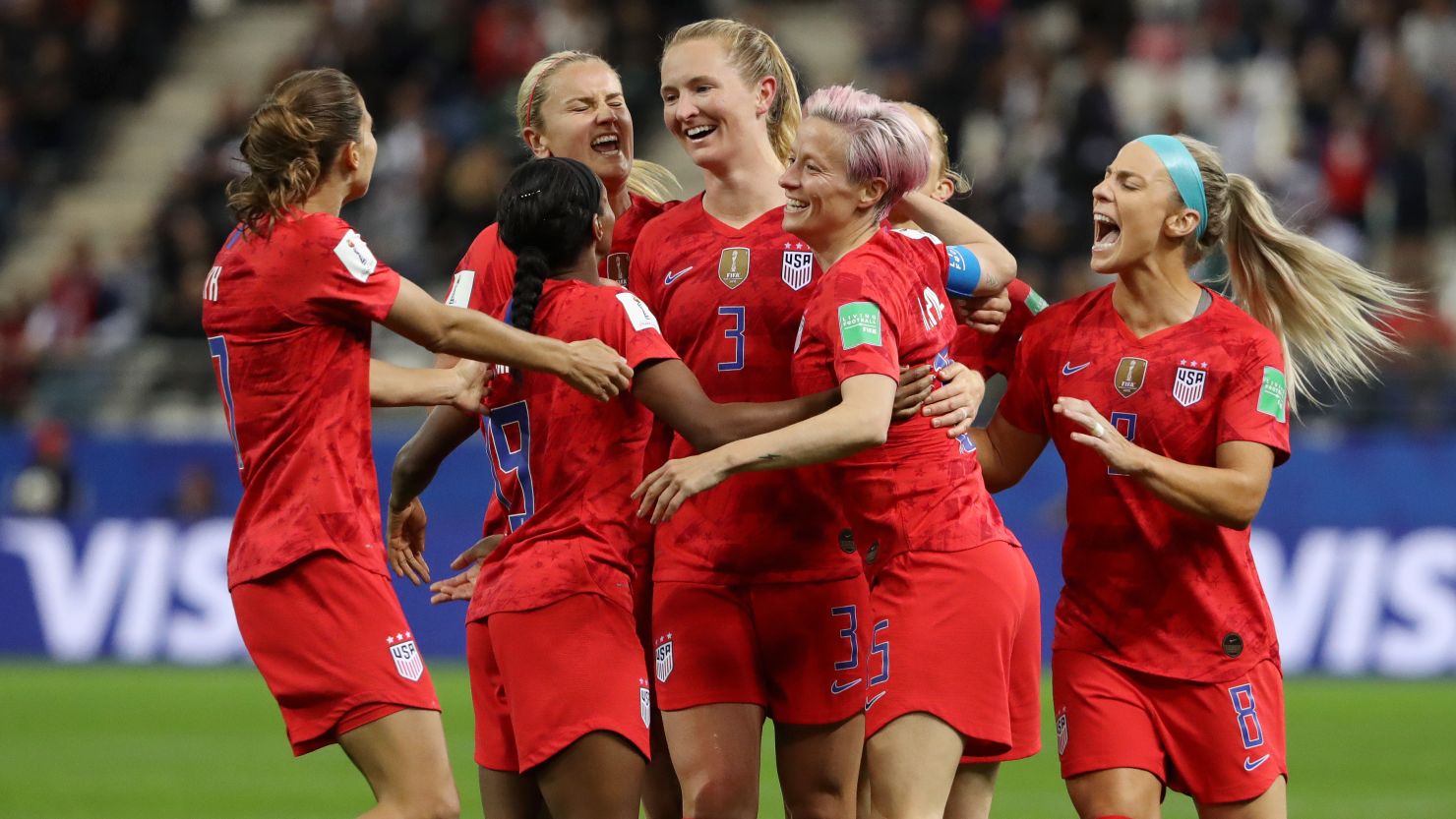 Samantha Mewis of the USA celebrates with teammates after scoring her team's fourth goal during the match against Thailand on Tuesday in France.