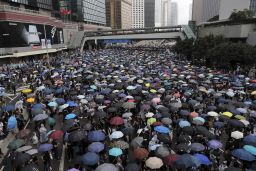 Protestors gather near the Legislative Council in Hong Kong, Wednesday, June 12, 2019. Hundreds of protesters surrounded government headquarters in Hong Kong on Wednesday as the administration prepared to open debate on a highly controversial extradition law that would allow accused people to be sent to China for trial. (AP Photo/Kin Cheung)