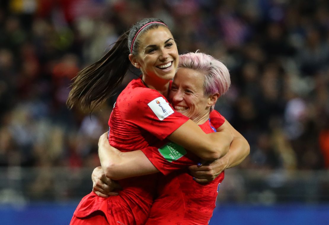 Alex Morgan (left) and Megan Rapinoe celebrate the US victory over Thailand.