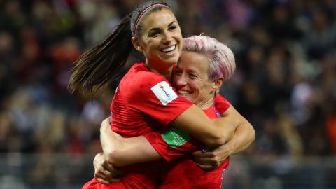 Alex Morgan, left, celebrates with Megan Rapinoe after scoring her team's 12th goal during the 2019 FIFA Women's World Cup on June 11 in Reims, France.