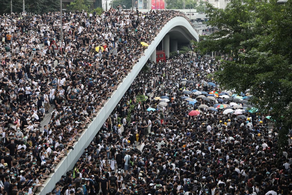 Protesters march along a road demonstrating against a proposed extradition bill in Hong Kong, China June 12, 2019. 