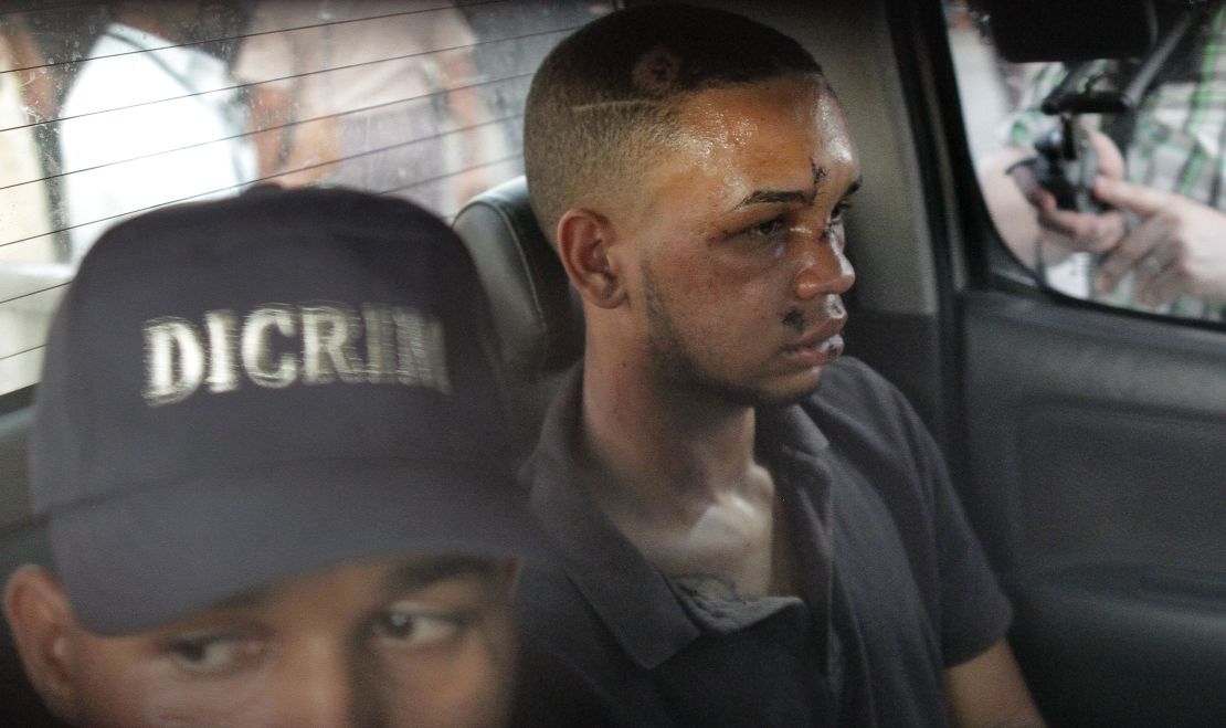 Eddy Vladimir Féliz Garcia, in custody in connection with the shooting, is transported by police to court.