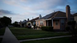 Houses line the street in the Crenshaw neighborhood of Los Angeles.