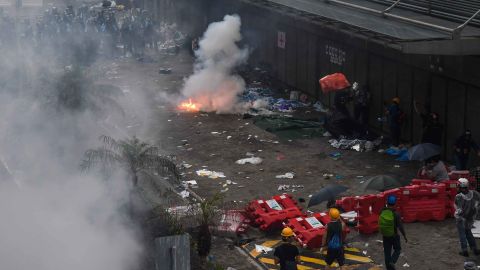 Police clash with protesters during a demonstration outside the government headquarters in Hong Kong on June 12.