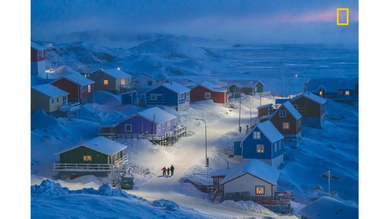 <strong>Grand prize, and 1st prize Cities category -- "Greenlandic Winter":</strong> The main prize in the <a href="index.php?page=&url=http%3A%2F%2Fnatgeo.com%2Ftravelphotocontest" target="_blank" target="_blank">2019 National Geographic Travel Photographer of the Year Contest </a>went to Chu Weimin."Upernavik is a fishing village on a tiny island in west Greenland.," he says. "This photo was taken during my three-month, personal photo project to present life in Greenland."