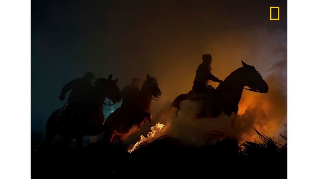 <strong>3rd prize People category -- "Horses": </strong>The third prize winner in this category of the<a href="http://natgeo.com/travelphotocontest" target="_blank" target="_blank"> 2019 National Geographic Travel Photographer of the Year Contest </a>is José Antonio Zamora. "Every year on the feast of Saint Anthony the ceremony of the purification of animals, called Las Luminarias, is celebrated in Spain. In the province of Avila, horses and horsemen jump over bonfires in the ritual that has been maintained since the 18th century," he says of his image.