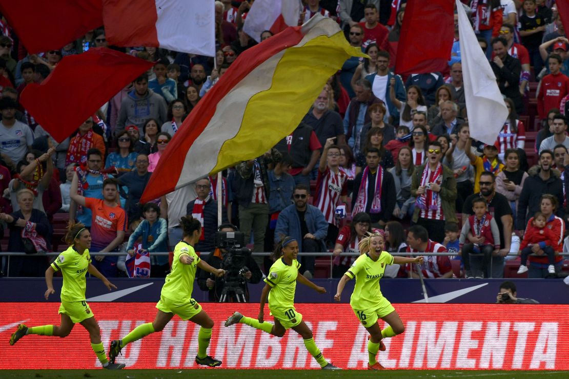 Barcelona FC's forward Toni Duggan (R) celebrates her goal against Atletico Madrid.