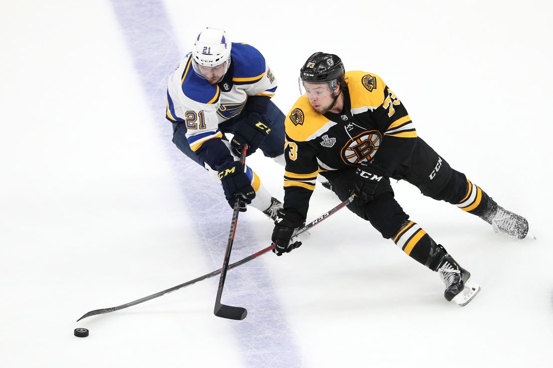 Charlie McAvoy of the Boston Bruins is defended by Tyler Bozak of the St. Louis Blues in Game 7.