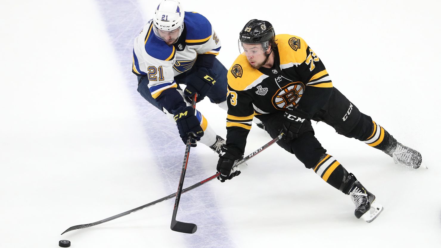  Charlie McAvoy, of the Boston Bruins, is defended by Tyler Bozak, of the St. Louis Blues, during the second period in Game 7.