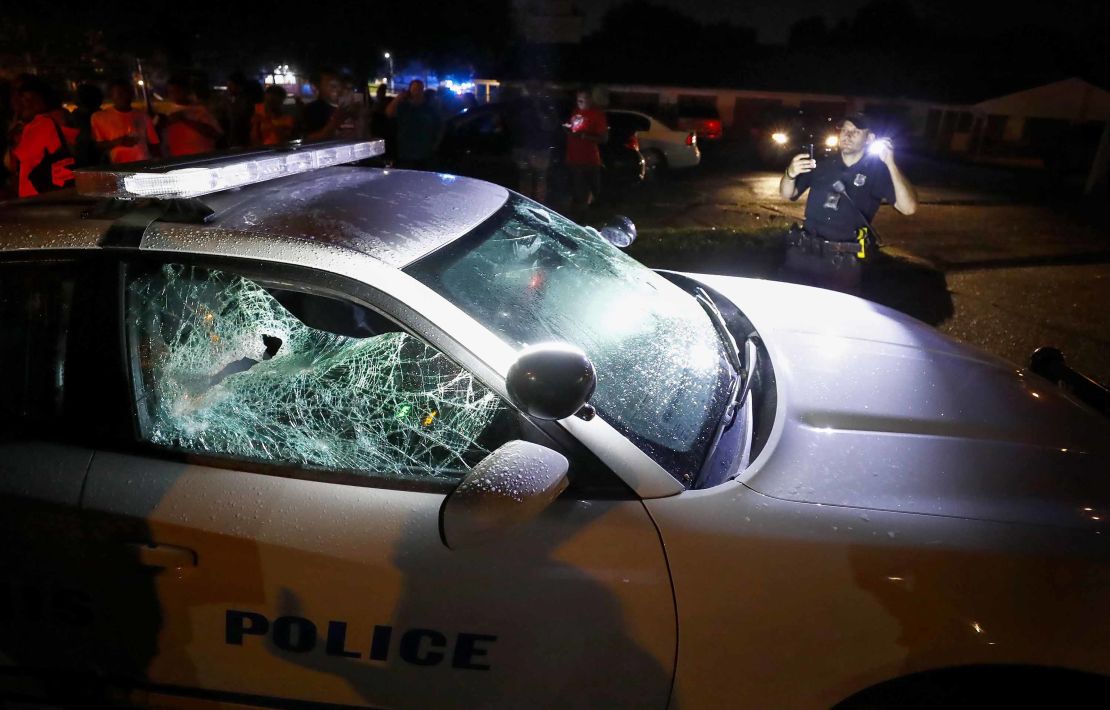 A squad car was damaged in the protests Wednesday in the north Memphis neighborhood of Frayser.