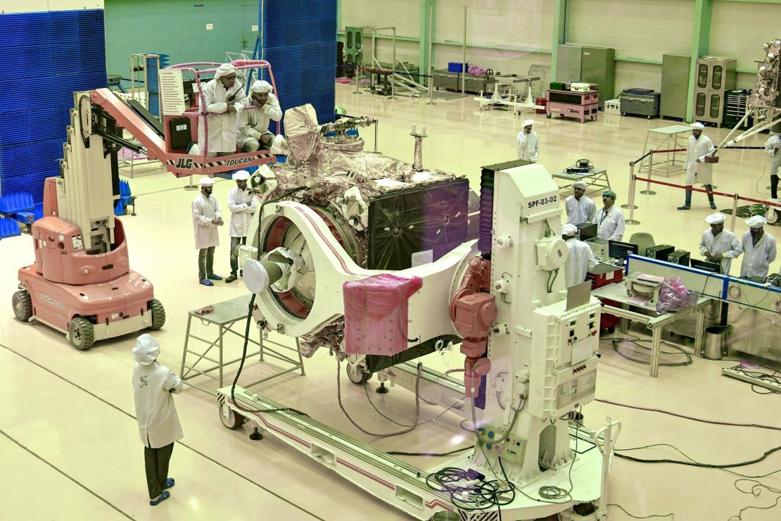 Indian Space Research Organisation (ISRO) scientists work on the orbiter vehicle of 'Chandrayaan-2' in Bangalore.