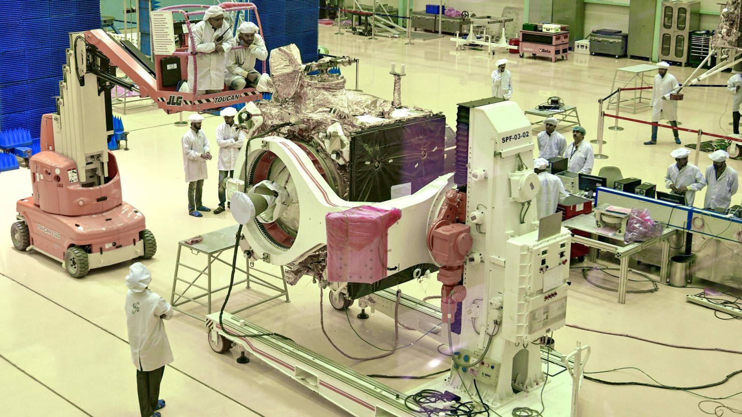 Scientists work on the orbiter vehicle of "Chandrayaan-2" for India's first moon lander and rover mission.