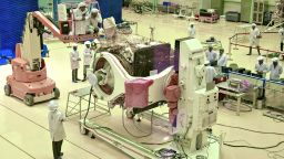 Indian Space Research Organisation (ISRO) scientists work on the orbiter vehicle of 'Chandrayaan-2', India's first moon lander and rover mission planned and developed by the ISRO, in Bangalore on June 12.