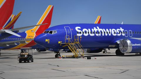 Southwest Airlines Boeing 737 MAX aircraft are parked on the tarmac after being grounded, at the Southern California Logistics Airport in Victorville, California on March 28, 2019. - After two fatal crashes in five months, Boeing is trying hard -- very hard -- to present itself as unfazed by the crisis that surrounds the company. The company's sprawling factory in Renton, Washington is a hive of activity on this sunny Wednesday, March 28, 2019, during a tightly-managed media tour as Boeing tries to communicate confidence that it has nothing to hide. Boeing gathered hundreds of pilots and reporters to unveil the changes to the MCAS stall prevention system, which has been implicated in the crashes in Ethiopia and Indonesia, as part of a charm offensive to restore the company's reputation.(Photo credit should read MARK RALSTON/AFP/Getty Images)