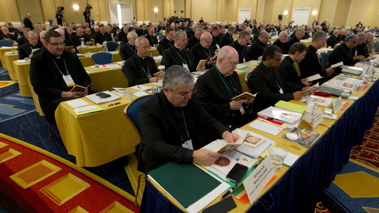Catholic Bishops participate in a morning prayer Tuesday during the US Conference of Catholic Bishops in Baltimore.