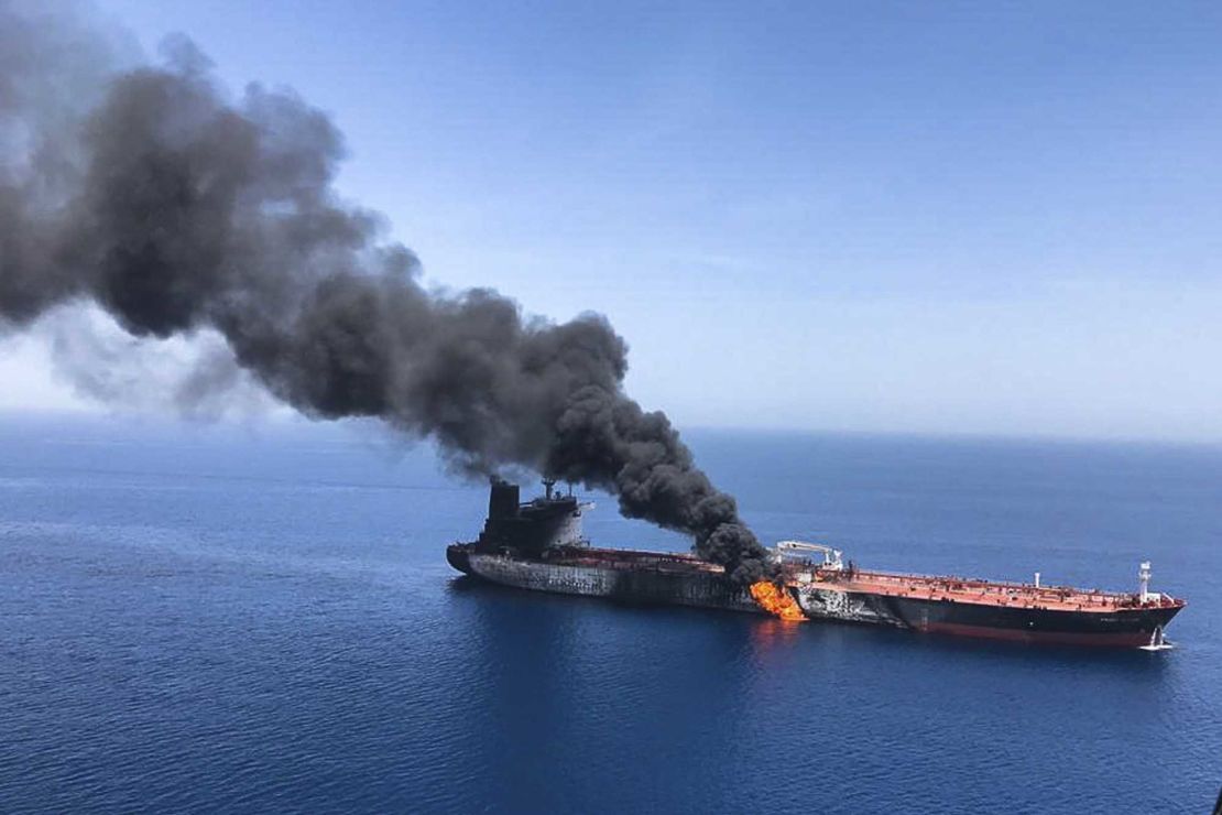 An oil tanker on fire near the strategic Strait of Hormuz on Thursday, June 13, 2019.