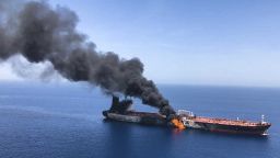 An oil tanker on fire in the sea of Oman, Thursday, June 13, 2019.