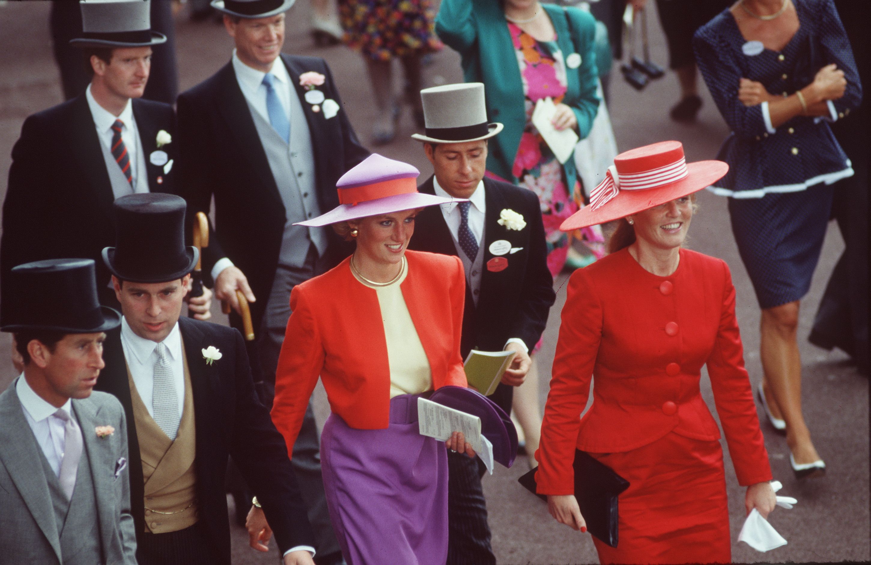 Ascot Races England UK 1986 scanned in 2018 the British Royal Family arrive  and walk about at Royal Ascot in 1986. Queen Mother Members of the public  dressed in fine hats and