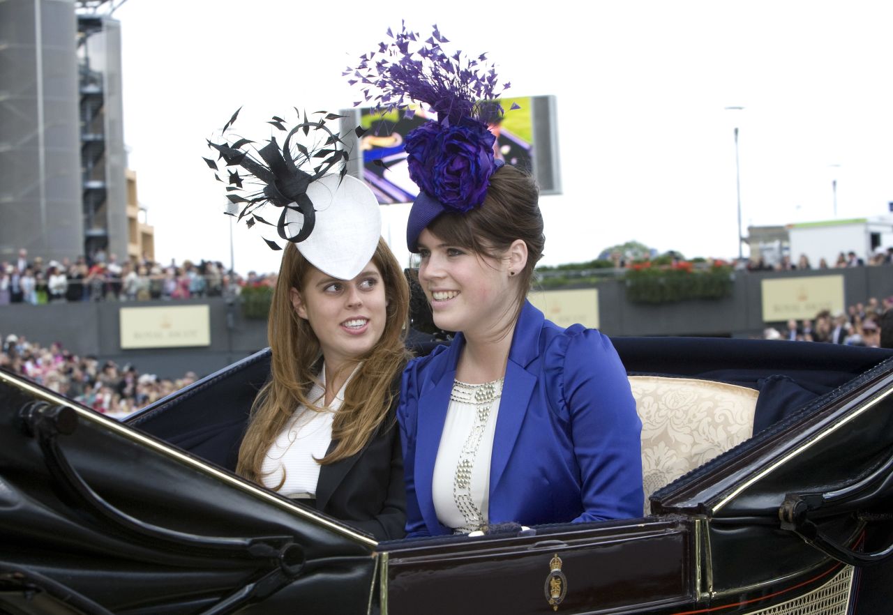 Princesses Eugenie and Beatrice arrive at Ascot Racecourse in 2008.