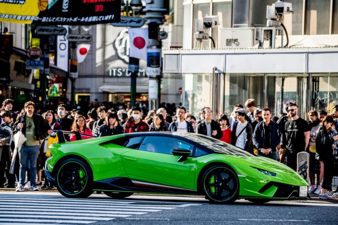 <strong>Sweet ride: </strong>A neon green Lamborghini gets some stares. 