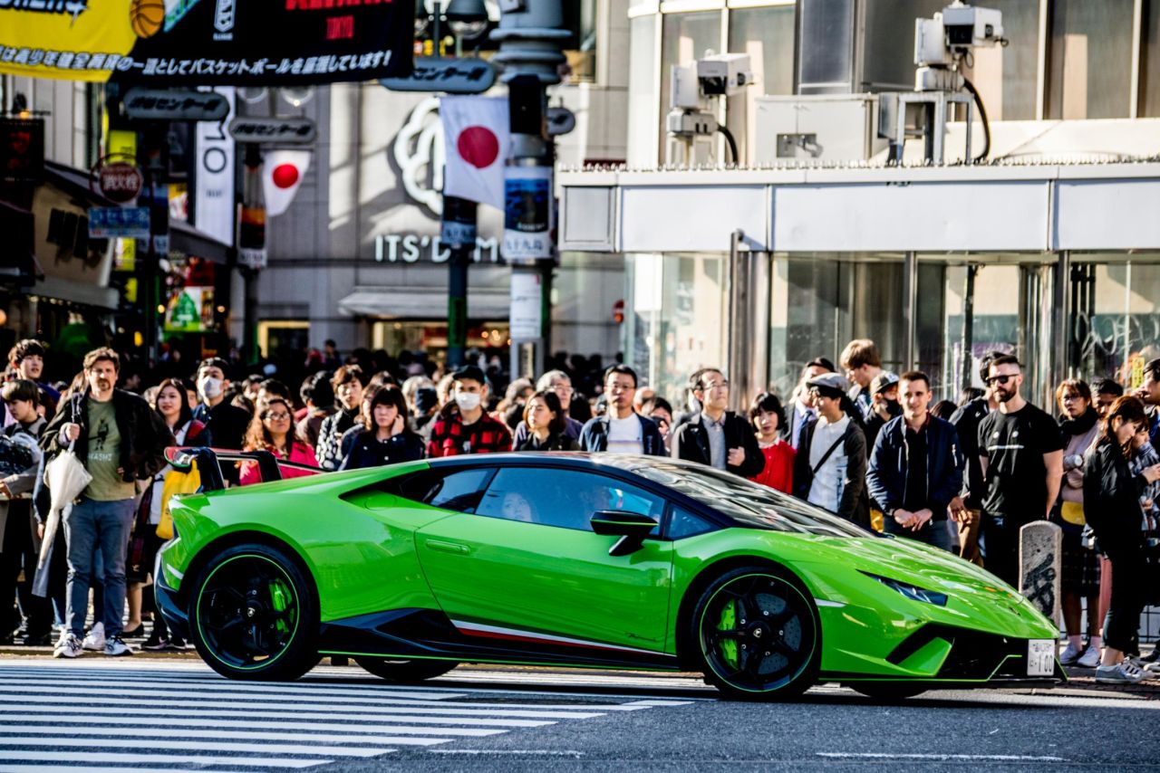 <strong>Sweet ride: </strong>A neon green Lamborghini gets some stares.