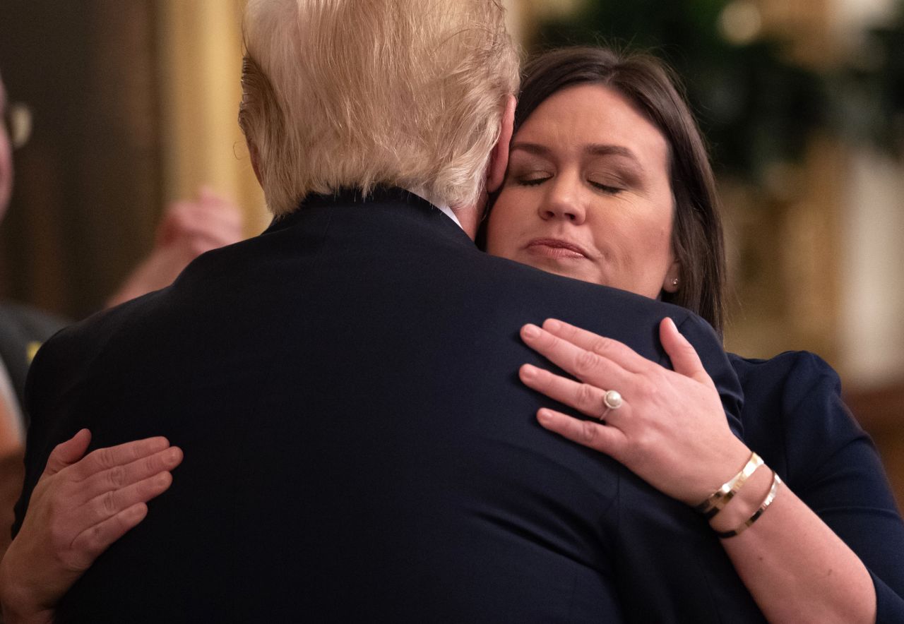 Outgoing White House Press Secretary Sarah Sanders hugs President Donald Trump in the East Room of the White House in Washington, DC on Wednesday, June 13.