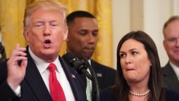 Outgoing White House Press Secretary Sarah Huckabee Sanders speaks alongside US President Donald Trump during a second chance hiring and criminal justice reform event in the East Room of the White House in Washington, DC, June 13, 2019. - President Donald Trump on Thursday made the surprise announcement of the departure of spokeswoman Sarah Sanders, who has been widely criticized for her performance in the White House. "After 3 1/2 years, our wonderful Sarah Huckabee Sanders will be leaving the White House at the end of the month and going home to the Great State of Arkansas," Trump tweeted, adding that he hoped she would run for governor of her state. (Photo by MANDEL NGAN / AFP)        (Photo credit should read MANDEL NGAN/AFP/Getty Images)