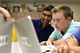 Google CEO Sundar Pichai looks at coding projects designed by 4H students at Roosevelt Elementary in Pryor, Oklahoma.