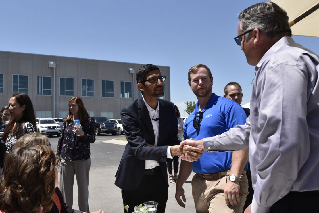 Google CEO Sundar Pichai greets attendees during an event at the company's data center in Pryor, Oklahoma, on Thursday.