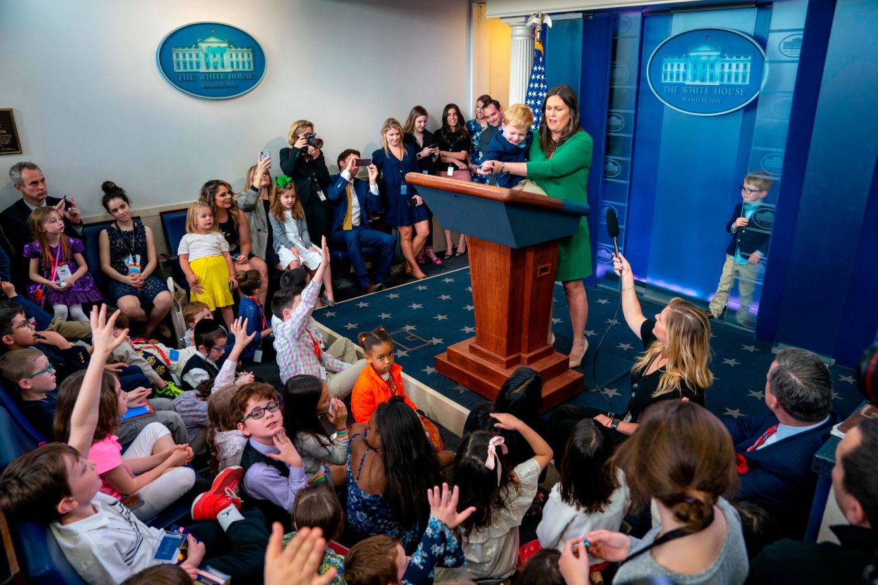 Sanders and her sons, William and George, take questions during "Take Your Kids To Work Day" at the White House in Washington, DC, on Thursday, April 26, 2018.