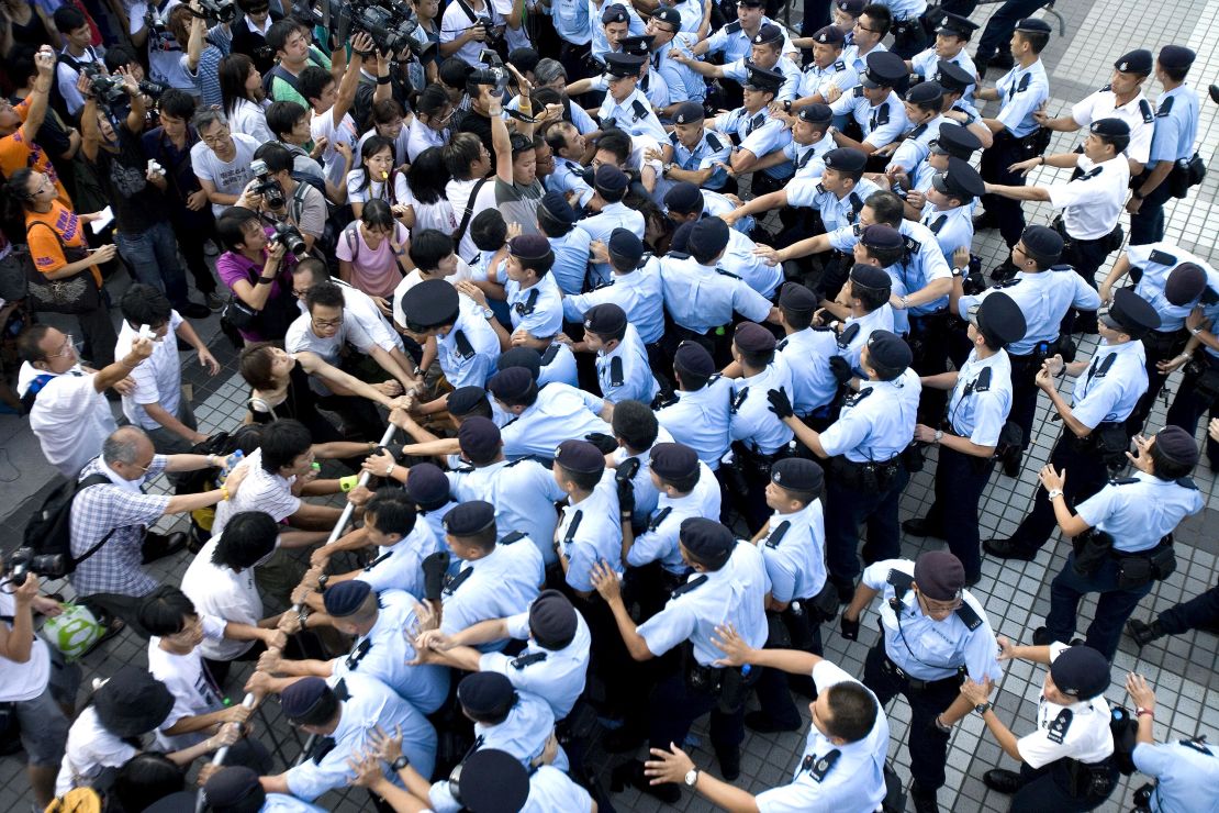 Protesters clash with police at Queen's Pier in Hong Kong, China, in August, 2007.