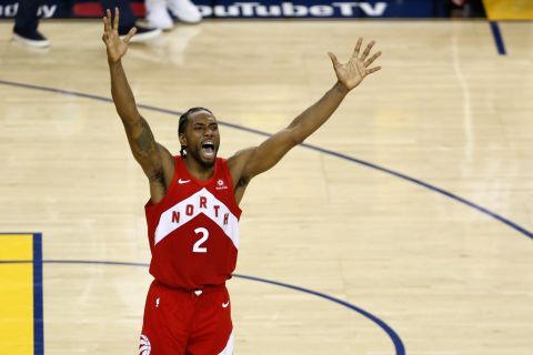 Kawhi Leonard celebrates after the Toronto Raptors won the NBA title with a 114-110 Game 6 victory over Golden State on Thursday, June 14. Leonard was named Finals MVP.
