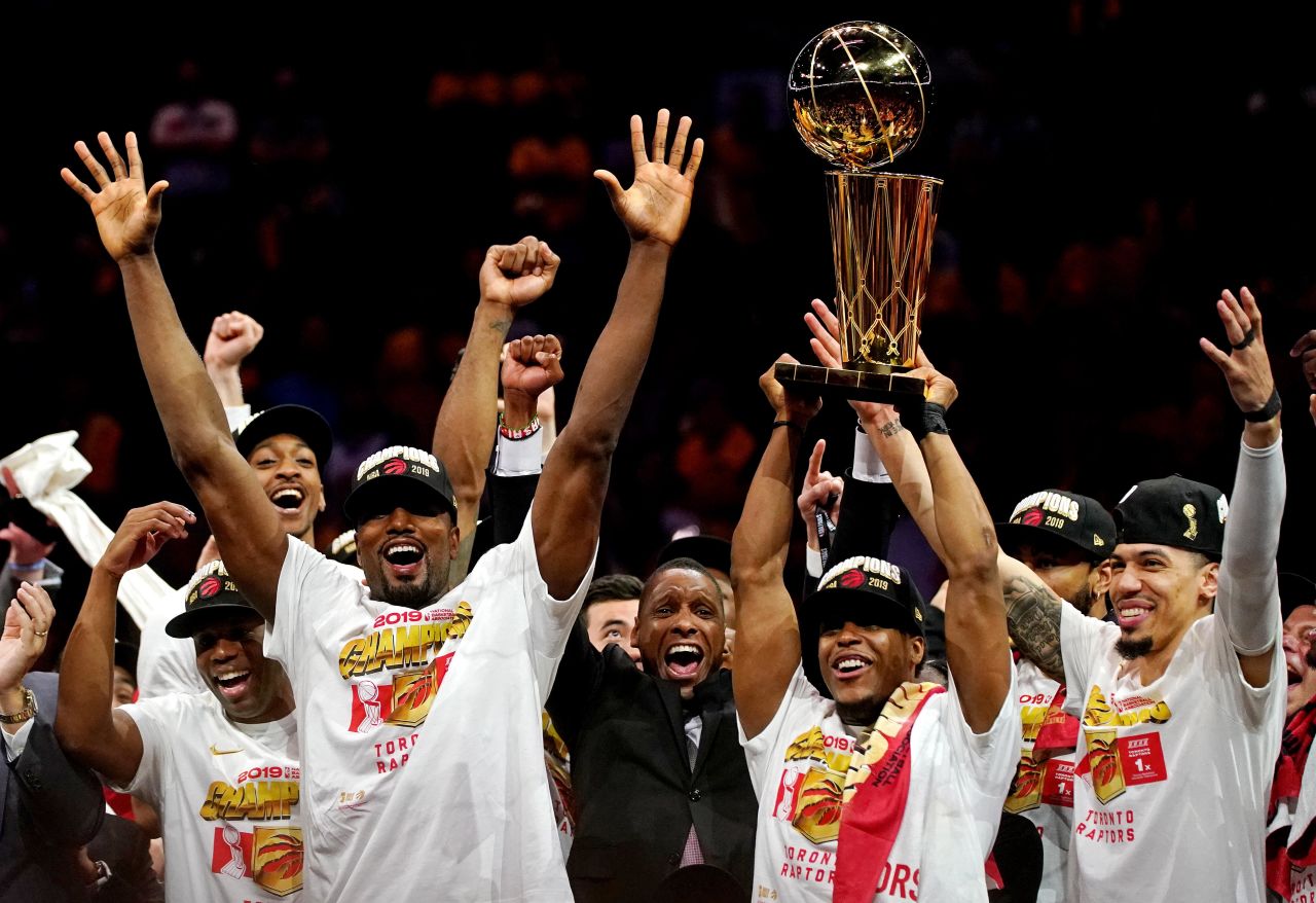 The Raptors celebrate with the Larry O'Brien Trophy.