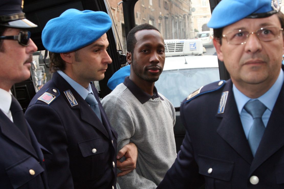 Rudy Guede arrives at the Perugia courthouse for an appeal hearing in 2009.
