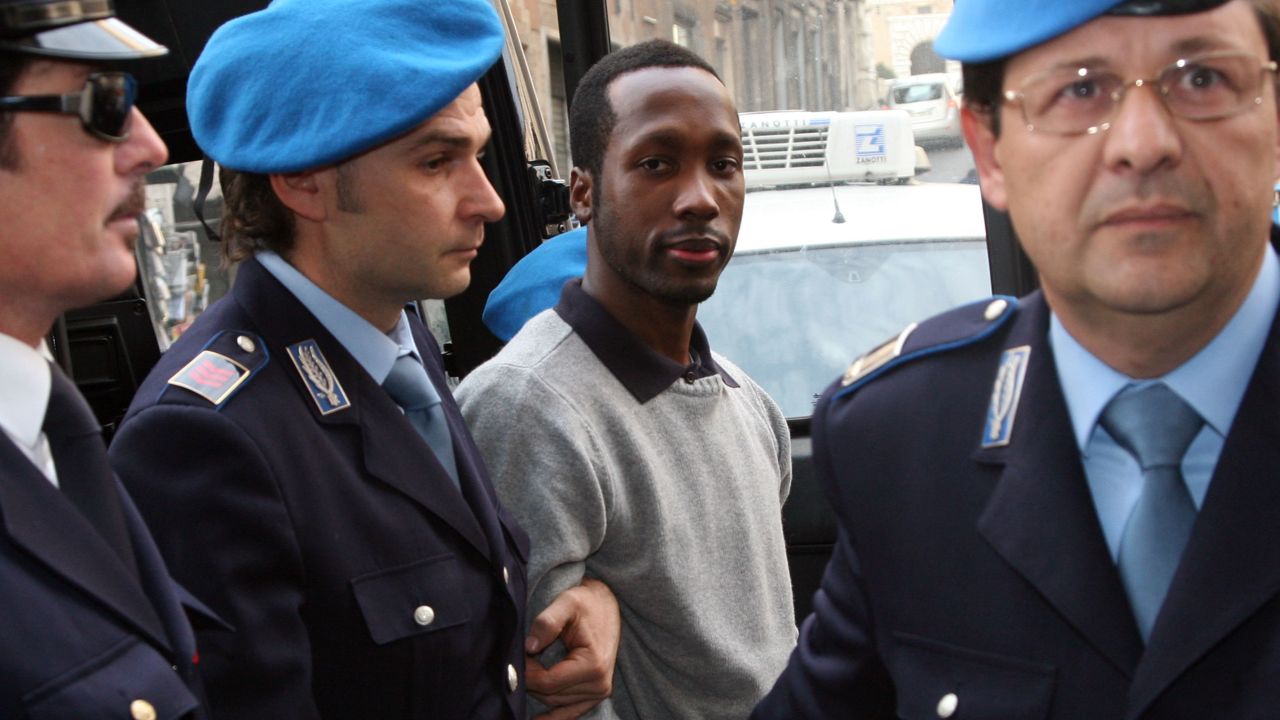 Rudy Guede arrives at the Perugia courthouse for an appeal hearing in 2009.
