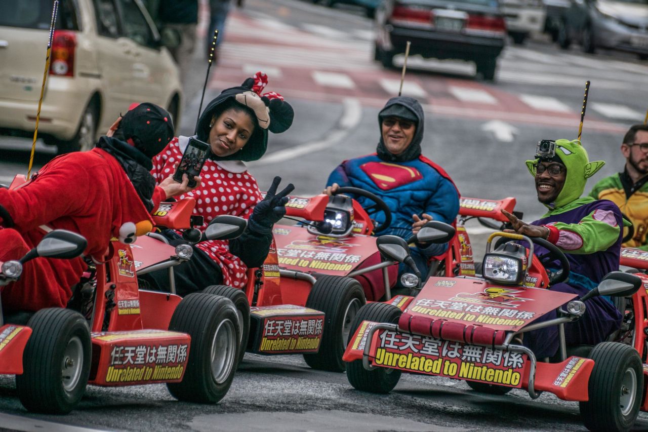 <strong>MariCar: </strong>Riders in the "Unrelated to Nintendo" go-karts, a popular Tokyo tour, make an appearance in costumes.