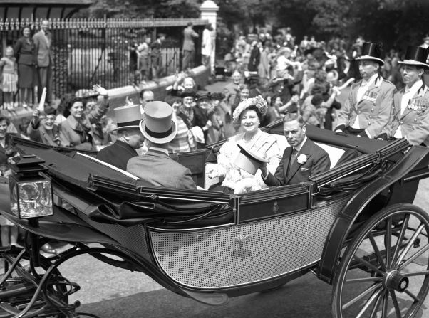 King George VI and Queen Elizabeth (the future Queen Mother) arrive at Royal Ascot in 1949.