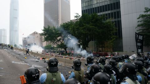 A police officer fire teargas during a protest on June 12, 2019 in Hong Kong.