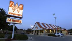 This Thursday, July 9, 2015 photo shows a Whataburger restaurant in San Antonio, Texas. The iconic Texas restaurant chain will not allow the open carrying of guns on its properties, taking a stand against a new law legalizing the practice. (AP Photo/Eric Gay)