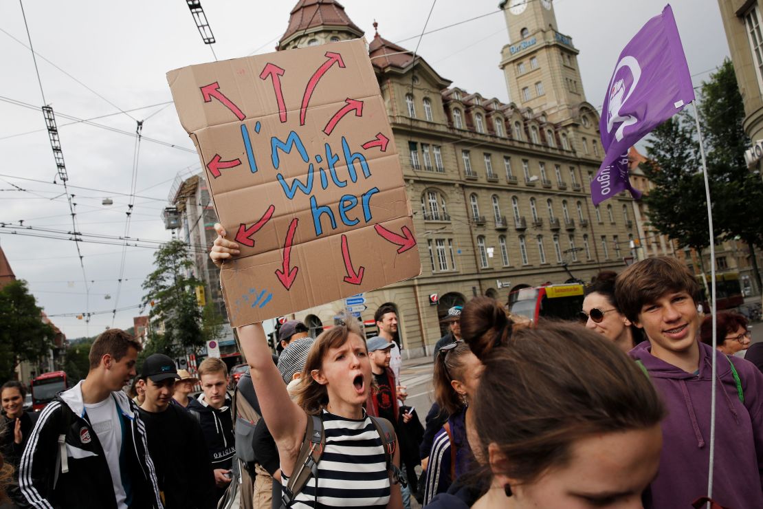 Women in the Swiss capital of Bern strike for equal rights during a nationwide protest on Friday. 
 