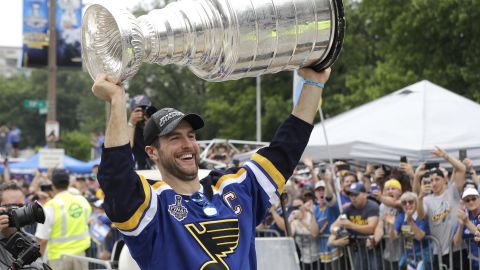 St. Louis Blues defenseman and captain Alex Pietrangelo carries the Stanley Cup during the Blues' NHL hockey Stanley Cup victory celebration in St. Louis on Saturday, June 15, 2019. (AP Photo/Darron Cummings)