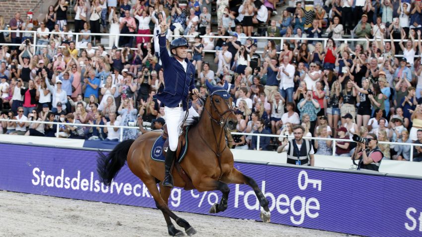 Peder Fredricson celebrates after winning the inaugural LGCT in the Olympic Stadium in Stockholm.