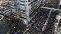 Thousands of protesters dressed in black take part in a new rally against a controversial extradition law proposal in Hong Kong on June 16, 2019. - Tens of thousands of people rallied in central Hong Kong on June 16 as public anger seethed following unprecedented clashes between protesters and police over an extradition law, despite a climbdown by the city's embattled leader. (Photo by Dale DE LA REY / AFP)        (Photo credit should read DALE DE LA REY/AFP/Getty Images)