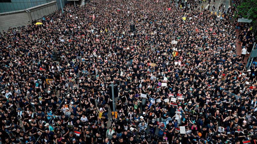 Tens of thousands of protesters march on the streets against an extradition bill in Hong Kong on Sunday, June 16, 2019. Hong Kong residents Sunday continued their massive protest over an unpopular extradition bill that has highlighted the territory's apprehension about relations with mainland China, a week after the crisis brought as many as 1 million into the streets. (AP Photo/Vincent Yu)