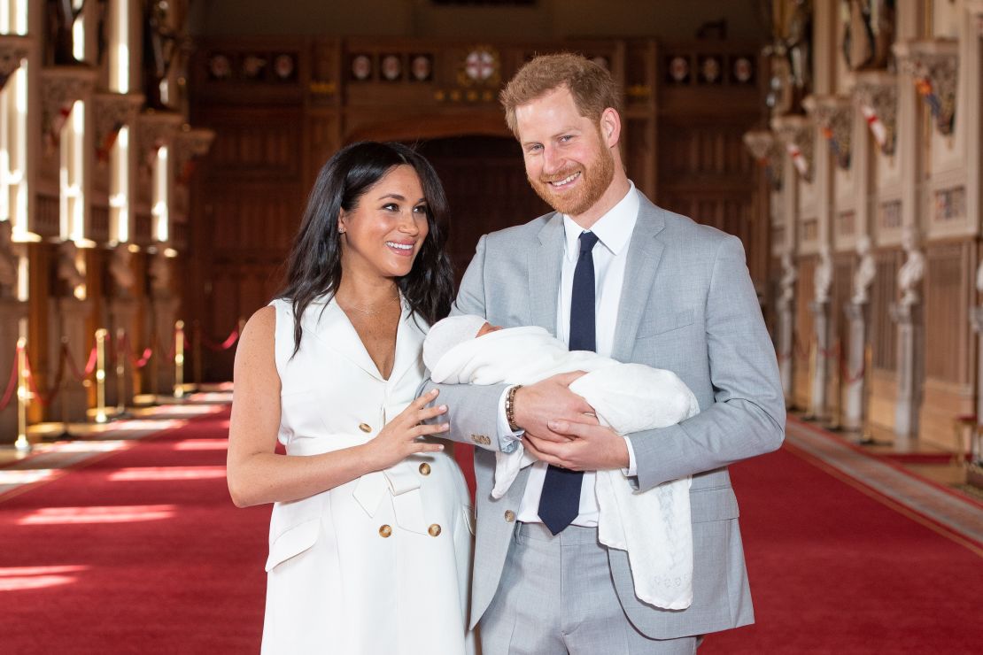 The Sussexes with their newborn son Archie Harrison Mountbatten-Windsor during a photocall in St George's Hall at Windsor Castle on May 8, 2019. 