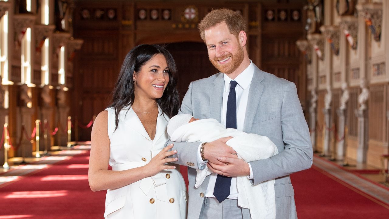The Sussexes with their newborn son Archie Harrison Mountbatten-Windsor during a photocall in St George's Hall at Windsor Castle on May 8, 2019. 